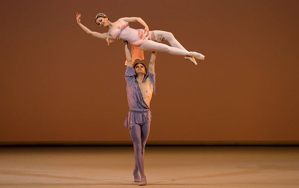 The Bolshoi Theater soloists Evgenia Obraztsova, Benois de la Danse nominee, and Denis Robkin, Benois-2015 nominee, do a performance choreographed by Marius Petipa, during a Nominees Gala Concert in the Bolshoi Theater in Moscow, Russia.