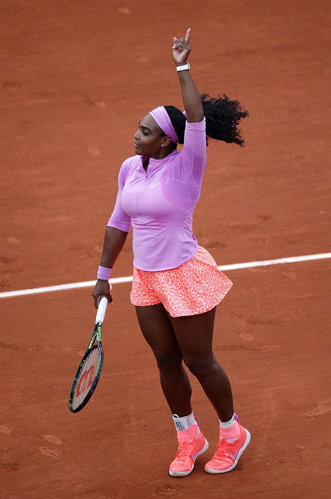 Serena Williams of the U.S. reacts after defeating Andrea Hlavackova of the Czech Republic during their first round match of the French Open tennis tournament at the Roland Garros stadium.