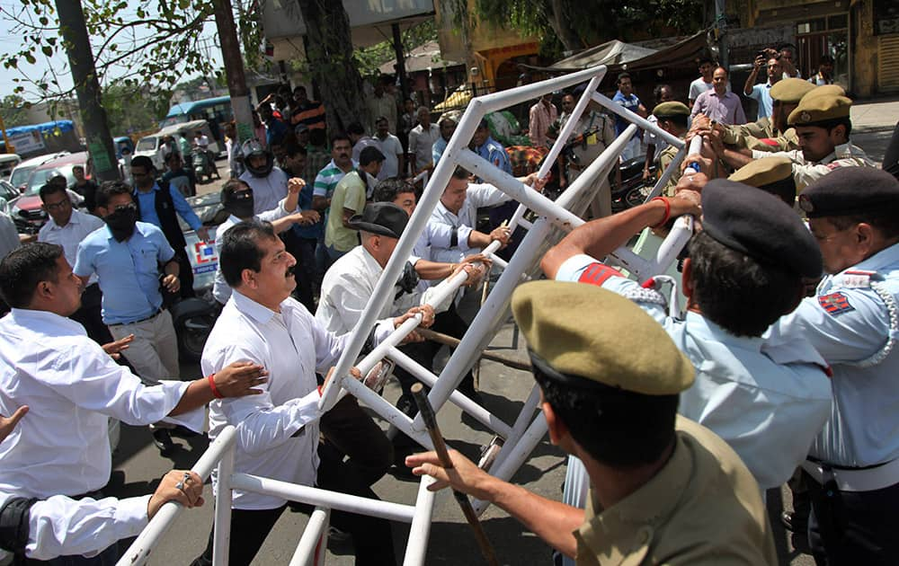 Members of Jammu bar association scuffle with policemen during a shutdown in Jammu.