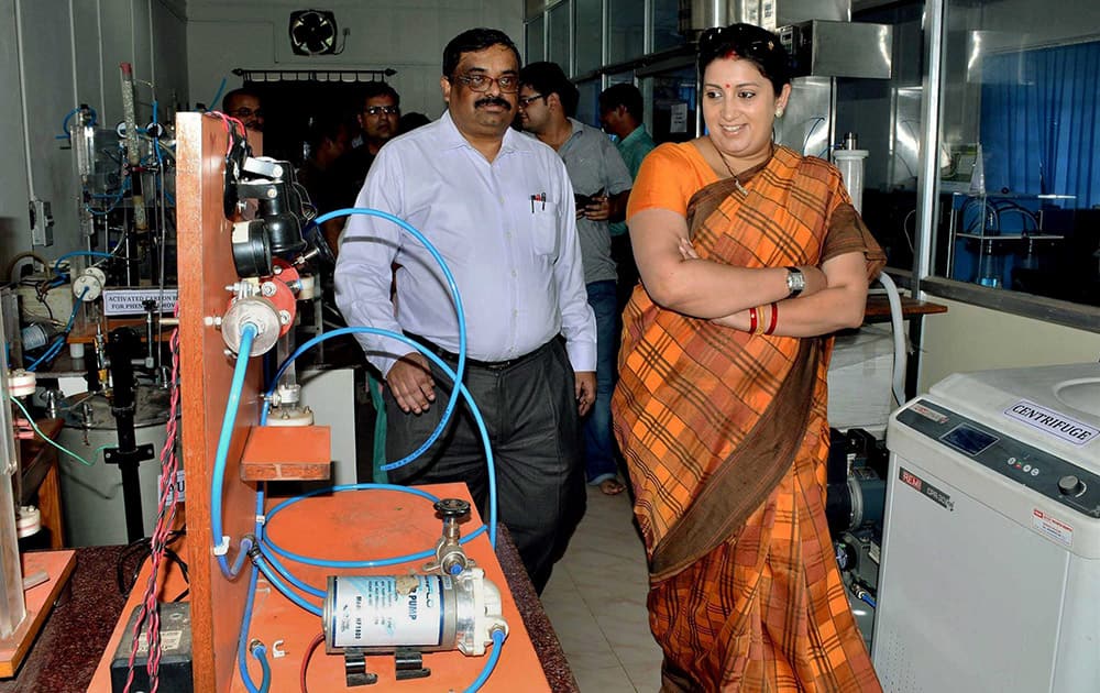 Human Resource Development Minister Samriti Irani with IIT Kharagpur director PP Chakraborty at Chemical Engineering laboratory during her visit at IIT Kharagpur in West Midnapore district of West Bengal.