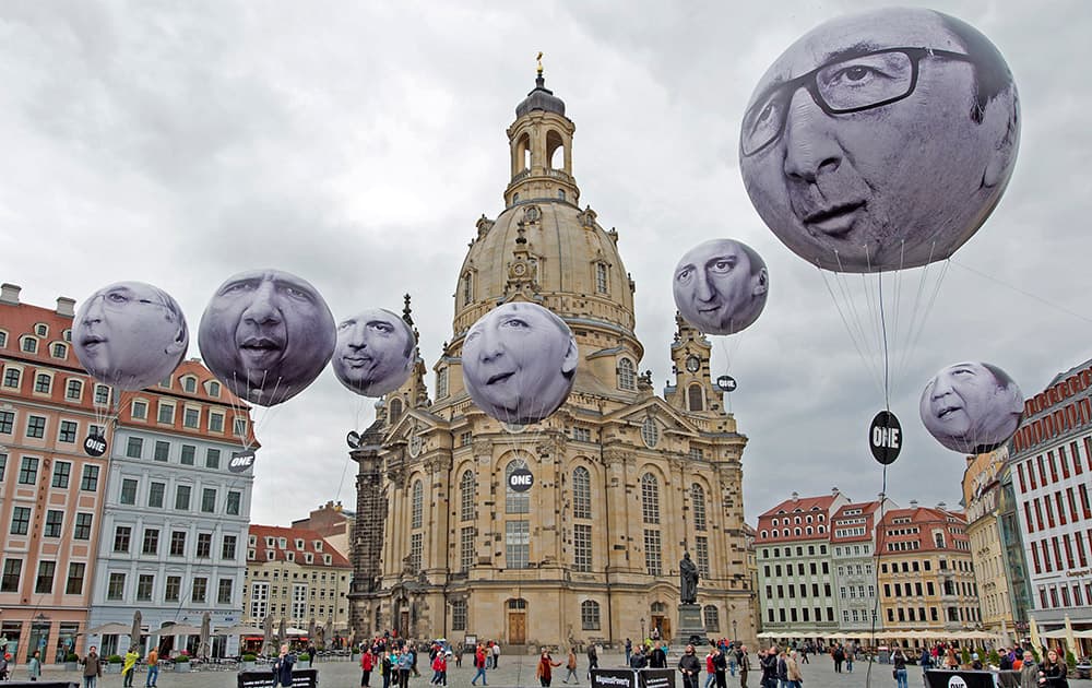 Activists of the international campaigning and advocacy organization ONE installed balloons with portraits of the G7 heads of state in front of the Frauenkirche cathedral (Church of Our Lady) prior to the G7 Finance Ministers meeting in Dresden, eastern Germany.