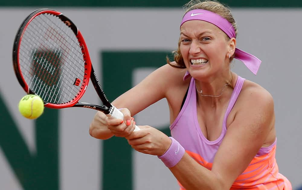 Petra Kvitova of the Czech Republic returns the ball to Spain's Silvia Soler-Espinosa during their second round match of the French Open tennis tournament at the Roland Garros stadium in Paris.