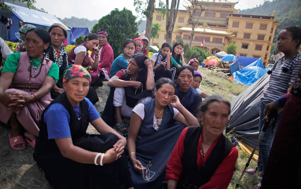 Victims of the April 25 earthquake that triggered a landslide in Langtang region rest at the Yellow Monastery premise in Kathmandu, Nepal.