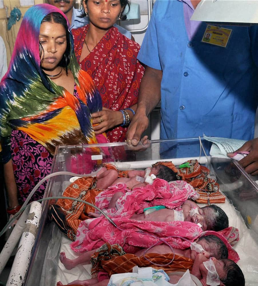 A woman gives birth to quadruplets at a hospital in Muzaffarpur, Bihar.