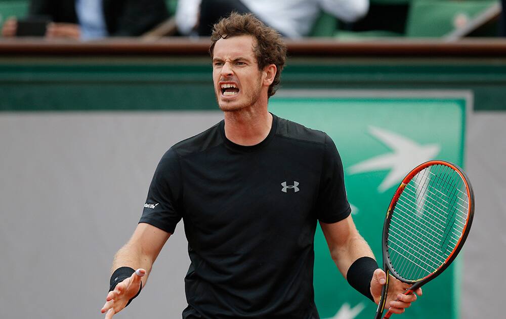 Britain's Andy Murray gestures after missing a return in the second round match of the French Open tennis tournament against Portugal's Joao Sousa at the Roland Garros stadium, in Paris, France.