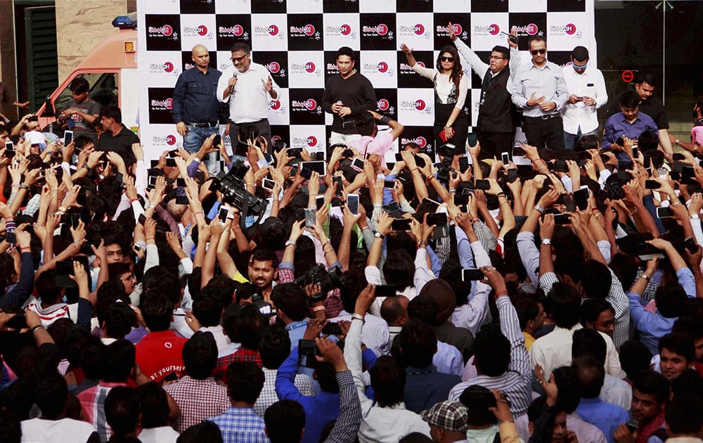 Cricket legend Sachin Tendulkar talking to media person during an event in Gurgaon.