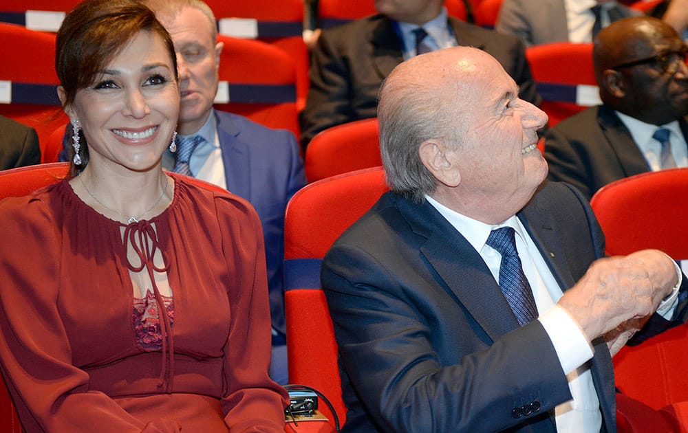 FIFA President Sepp Blatter sits next to his girlfriend Linda Gabrielian at the opening ceremony of the FIFA congress in Zuerich, Switzerland.