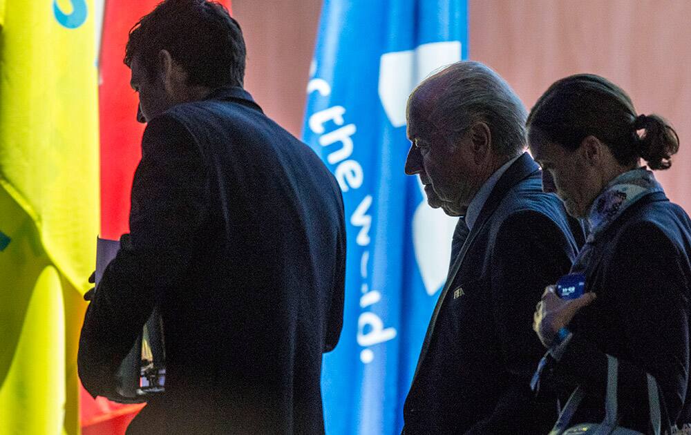 FIFA president Joseph S. Blatter is on his way out for lunch during the 65th FIFA Congress held at the Hallenstadion in Zurich, Switzerland.