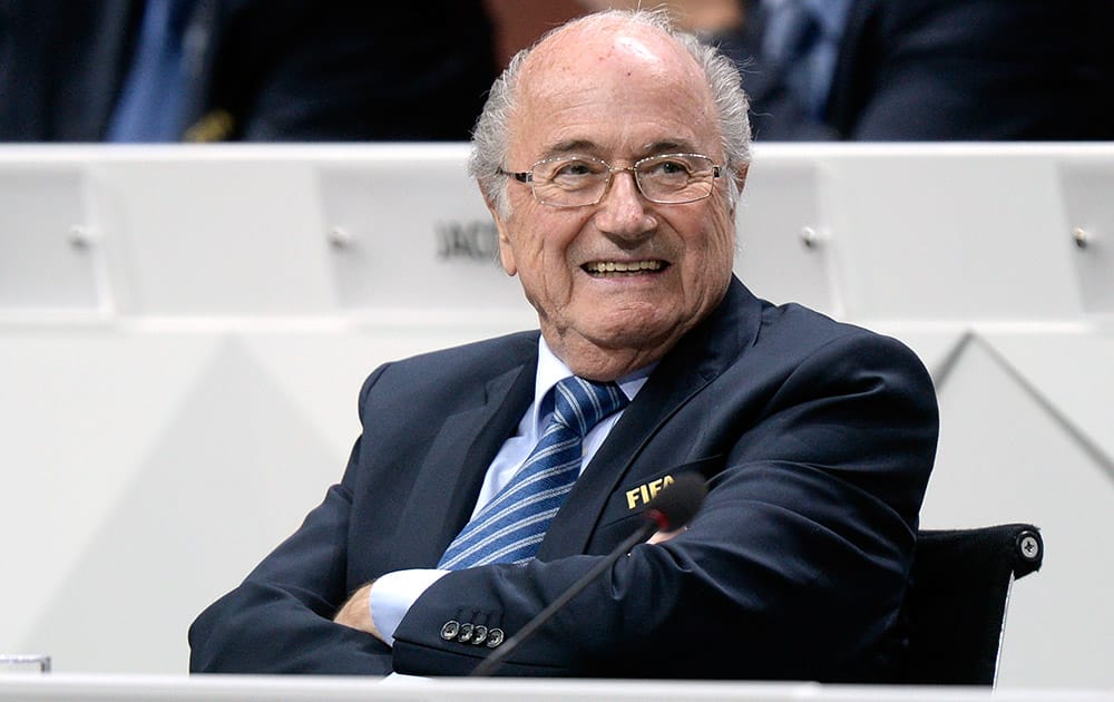 FIFA president Sepp Blatter smiles as he attends the 65th FIFA Congress held at the Hallenstadion in Zurich, Switzerland.