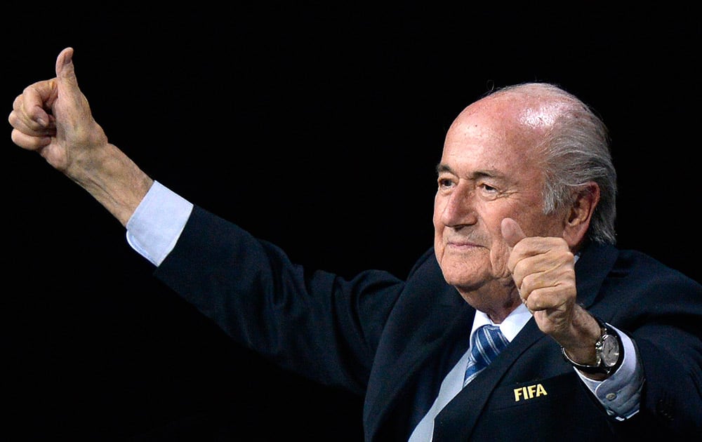 FIFA president Sepp Blatter gestures after his re-election during the 65th FIFA Congress held at the Hallenstadion in Zurich, Switzerland.