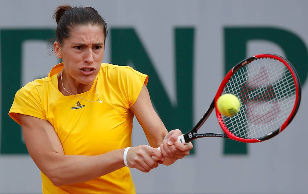 Germany's Andrea Petkovic returns in the third round match of the French Open tennis tournament against Italy's Sara Errani at the Roland Garros stadium, in Paris, France.