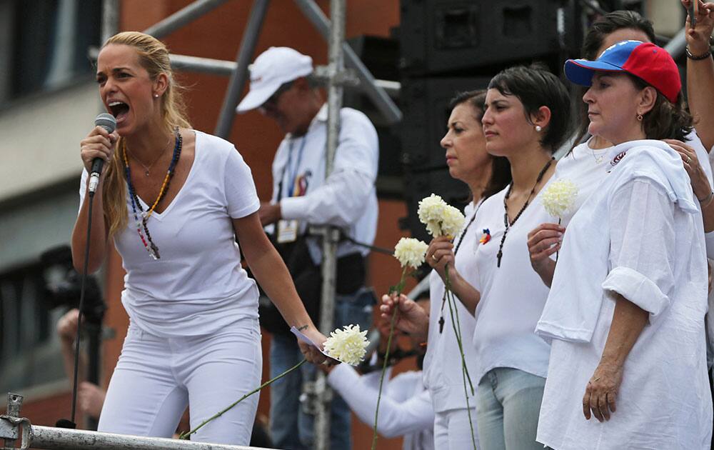 Lilian Tintori, wife of jailed opposition leader Leopoldo Lopez, speaks during an anti-government protest in Caracas, Venezuela.