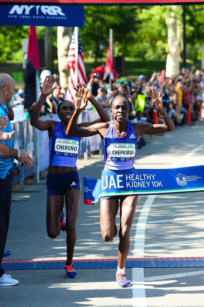 Joyce Chepkirui, 26, of Kenya, breaks the tape ahead of fellow Kenyan, Gladys Cherono, 32, with a time of 32:33 winning the womens division at the UAE Healthy Kidney 10K.