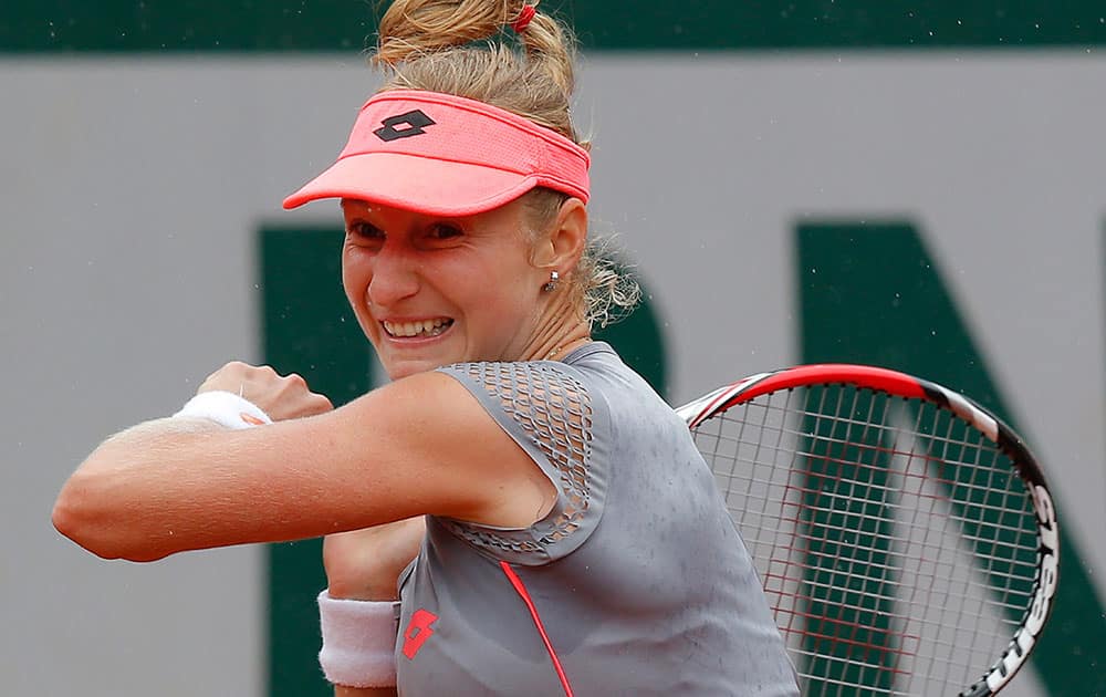 Russia's Ekaterina Makarova returns in the fourth round match of the French Open tennis tournament against Serbia's Ana Ivanovic at the Roland Garros stadium.