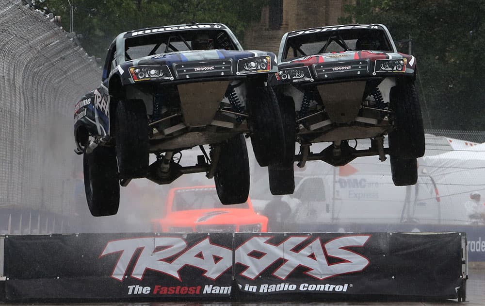 Keegan Kincaid, left, and P.J. Jones hit a jump during the SPEED Energy Formula Off-Road race before the second race of the IndyCar Detroit Grand Prix auto racing doubleheader, in Detroit. 