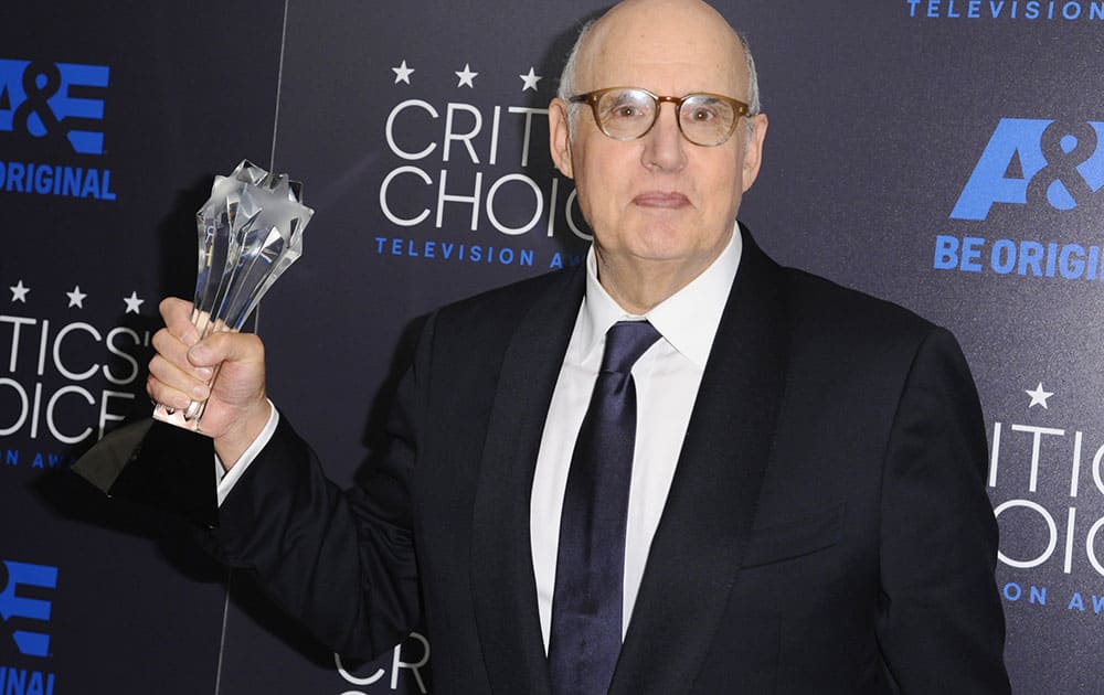 Jeffrey Tambor poses in the press room with the award for best actor in a comedy series for “Transparent