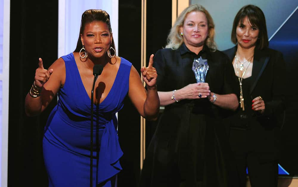 Queen Latifah, left, and Lili Fini Zanuck accept the award for best movie made for television for “Bessie” at the Critics' Choice Television Awards.