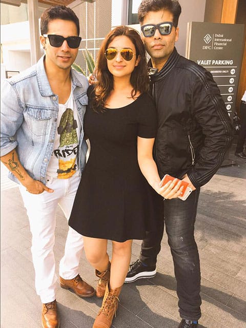 Varun SURESH Dhawan :- Dubai sunshine with #karanjohar and the young and restless home shopper #ParineetiChopra #AIBA 