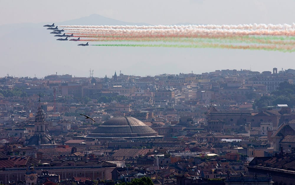 The 'Frecce Tricolori' Italian Air Force acrobatic squad fly over Rome, during the Republic Day parade celebrating the anniversary of the birth of the Italian Republic in 1946.