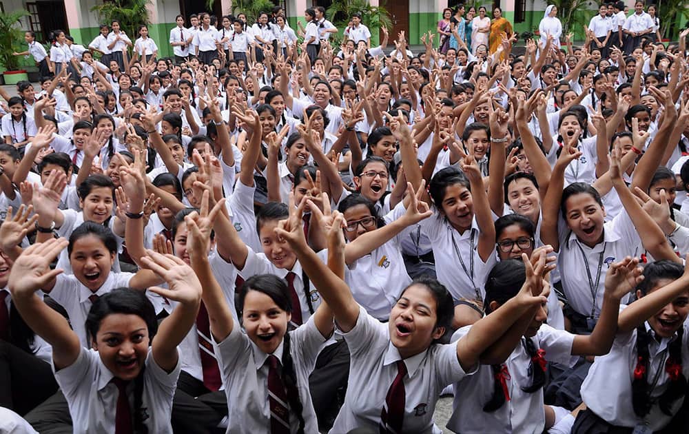 Students of St. Mary’s School celebrate after the declaration of HSLC exam results under Board of Secondary Education, Assam (SEBA) in Guwahati.