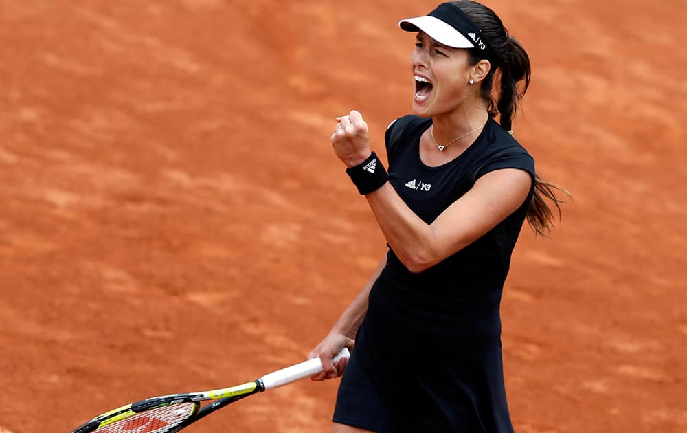 Serbia's Ana Ivanovic reacts as she plays Ukraine's Elina Svitolina during their quarterfinal match of the French Open tennis tournament at the Roland Garros stadium in Paris. Ivanovic won 6-3, 6-2.