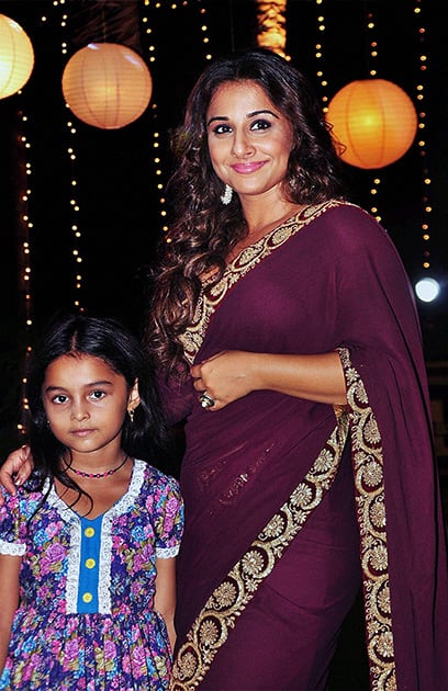 Television child actress Spandan Chaturvedi and bollywood actress Vidya Balan during the on-location shoot of television serial Udann in Mumbai.