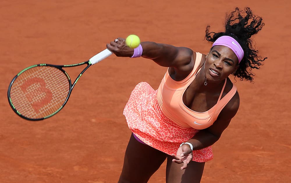Serena Williams of the US returns in the quarterfinal match of the French Open tennis tournament against Italy's Sara Errani at the Roland Garros stadium, in Paris, France
