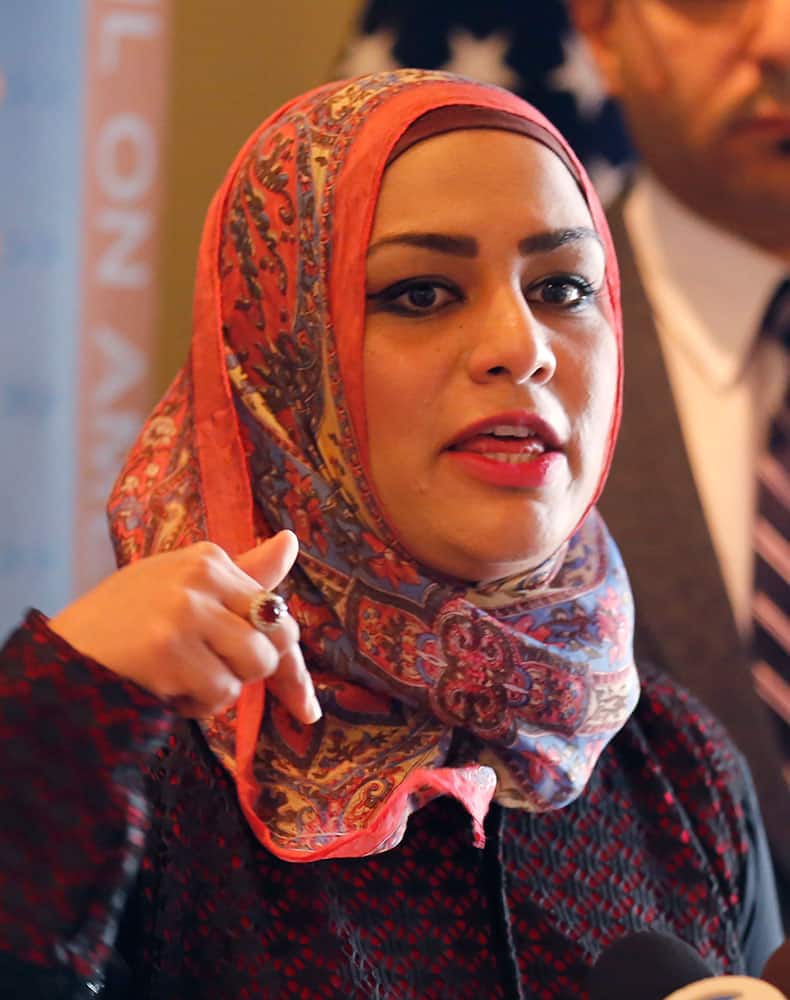 Muslim chaplain Tahera Ahmad responds to a question during a news conference, in Chicago. 