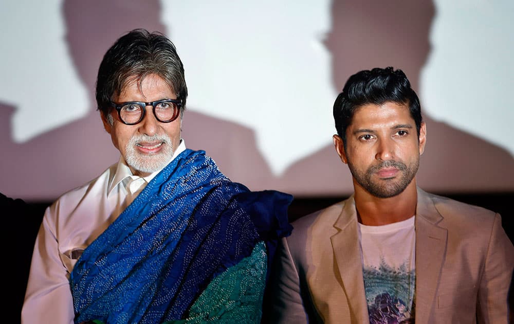 Bollywood actors Amitabh Bachchan, left, and Farhan Akhtar pose for the media during a trailer launch of their movie “Wazir” in Mumbai.