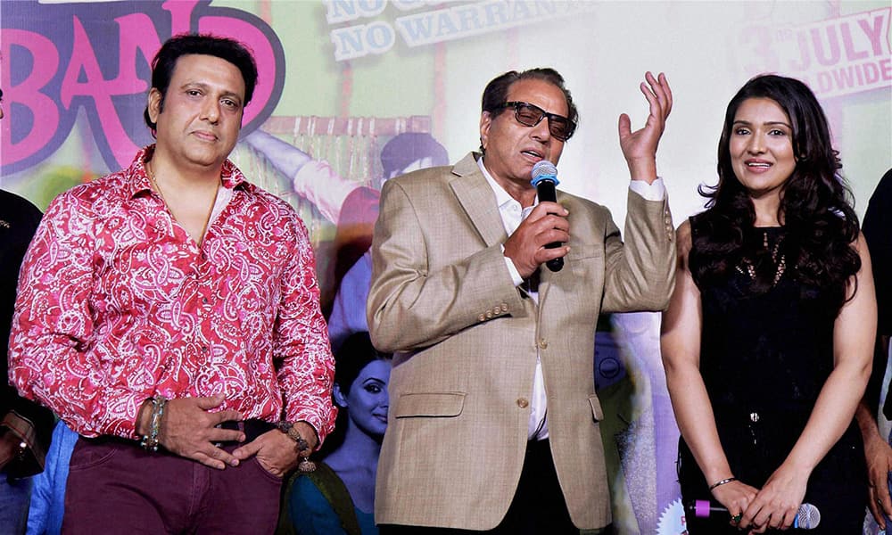 Bollywood actors Dharmendra and Govinda and actress Narmada Ahuja during trailer launch of the film Second Hand Husband in Mumbai.