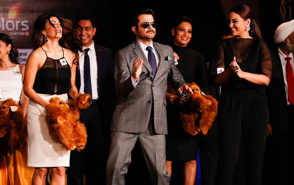 Anil Kapoor dances during the International Indian Film Awards (IIFA) press conference in Kuala Lumpur, Malaysia. The 16th IIFA is scheduled for June 5-7 in Malaysia.