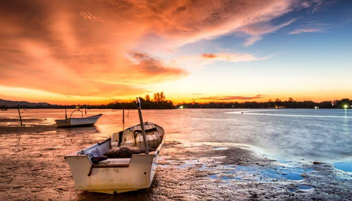 Beautiful sunset with the fishing boats