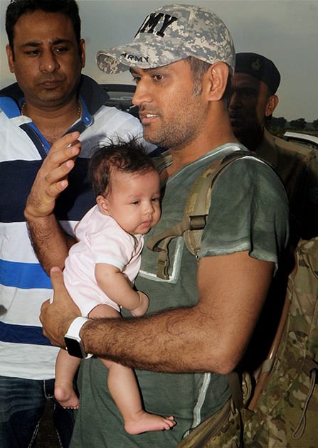 Mahendra Singh Dhoni with daughter Ziva at Birsa Munda International Airport in Ranchi.