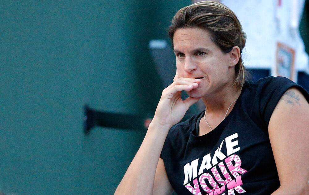 France's Amelie Mauresmo, a coach of Andy Murray, watches Britain's Andy Murray playing Serbia's Novak Djokovic during their semifinal match of the French Open tennis tournament at the Roland Garros stadium in Paris.