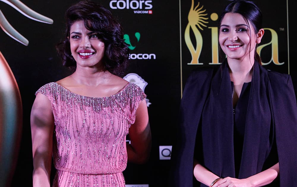 Priyanka Chopra and Anushka Sharma arrive for the IIFA Gala Screening as part of the three-day long International Indian Film Academy (IIFA) awards held in Kuala Lumpur, Malaysia.