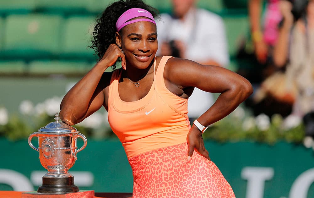 Serena Williams of the U.S. poses with the cup after defeating Lucie Safarova of the Czech Republic in their final match of the French Open tennis tournament at the Roland Garros stadium.