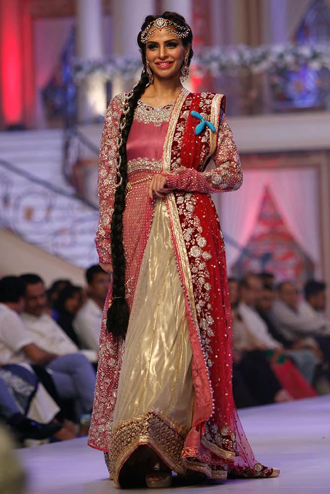 A model presents creations by Pakistani designer Ayesha Ibrahim at Bridal Couture Week in Karachi, Pakistan.