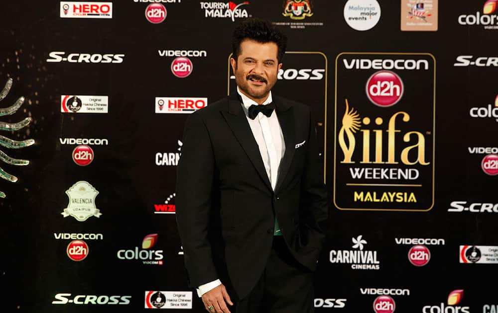 Bollywood actor Anil Kapoor poses on the green carpet at the International Indian Film Academy (IIFA) awards in Kuala Lumpur, Malaysia.