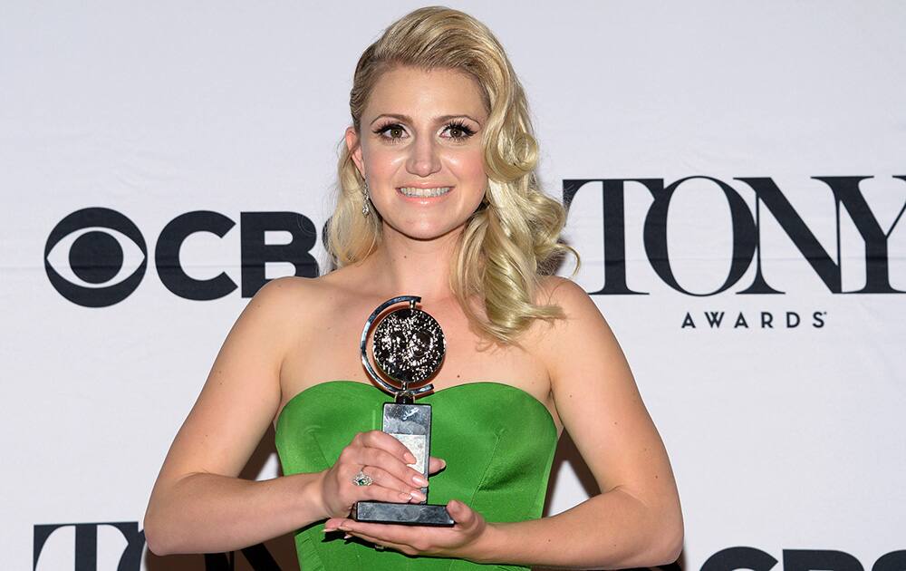 Annaleigh Ashford poses with the award for best performance by an actress in a featured role in a play for 'You Can’t Take it With You' in the press room at the 69th annual Tony Awards at Radio City Music Hall, in New York. 