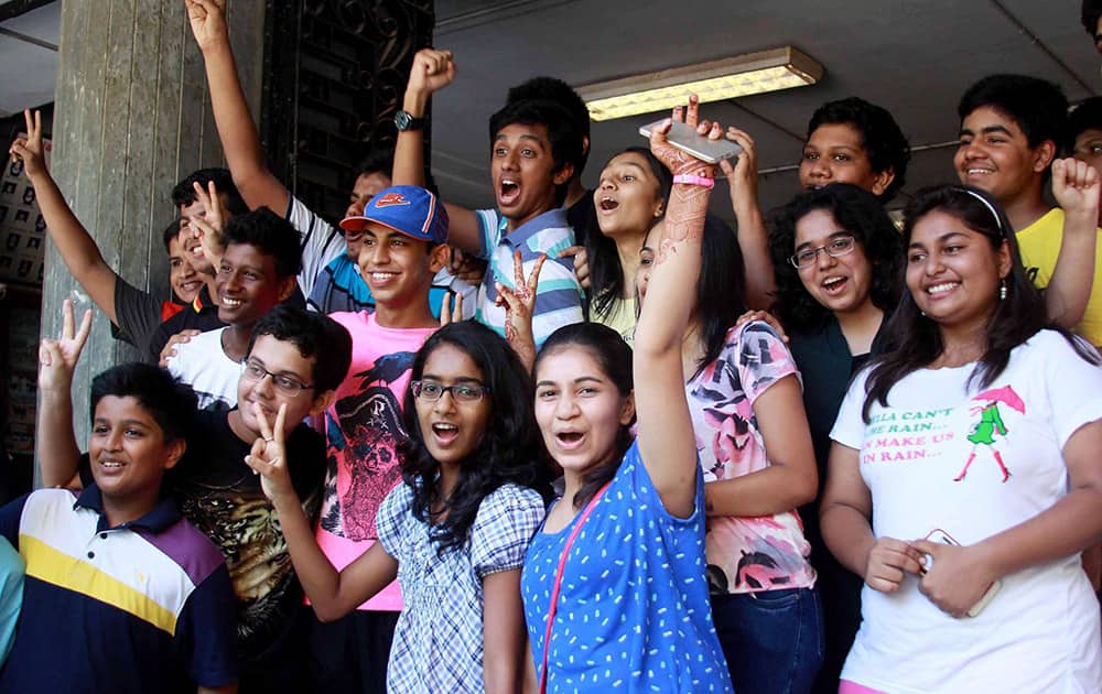Students celebrate their success after declaration of Maharashtra State Board of Secondary School Certificate SSC examination results in Mumbai.