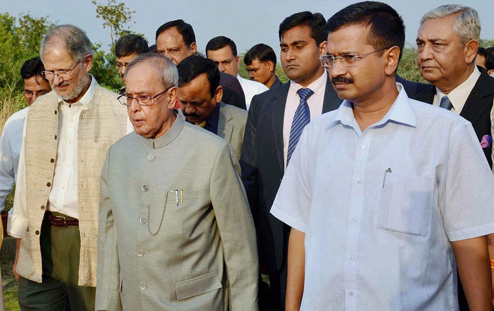 President Pranab Mukherjee with Delhi Lt Governor Najeeb Jung and Chief Minister Arvind Kejriwal at the inauguration of a sewage treatment plant at the President’s Estate in New Delhi.