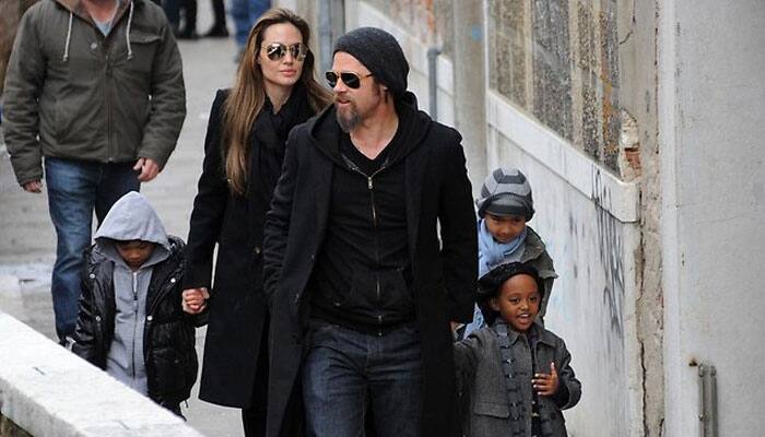 Brangelina flies &#039;economically&#039; to France with kids