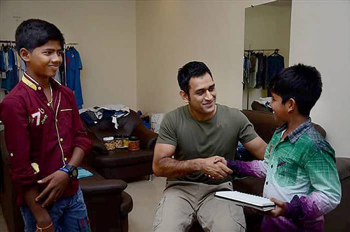 MS Dhoni meeting with Child artists Ramesh (12) and Vignesh (14) in Mumbai. The kids were flown down to Mumbai to meet Dhoni as they are the crazy fans of the cricketer.