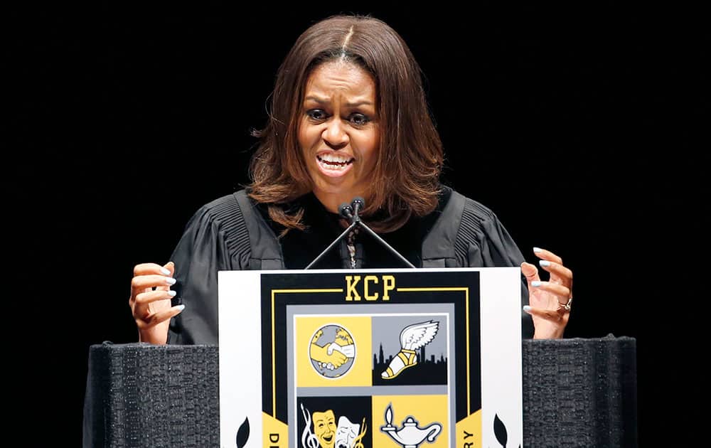 First lady Michelle Obama delivers the commencement address during graduation ceremonies for the Class of 2015 at Dr. Martin Luther King College Preparatory High School held on the campus of Chicago State University, in Chicago. 