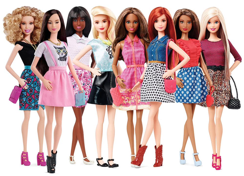 This photo shows barbie dolls wearing high heel and flat shoes. A new line of Barbie dolls has the 56-year-old fashionista rocking flat shoes for the first time.