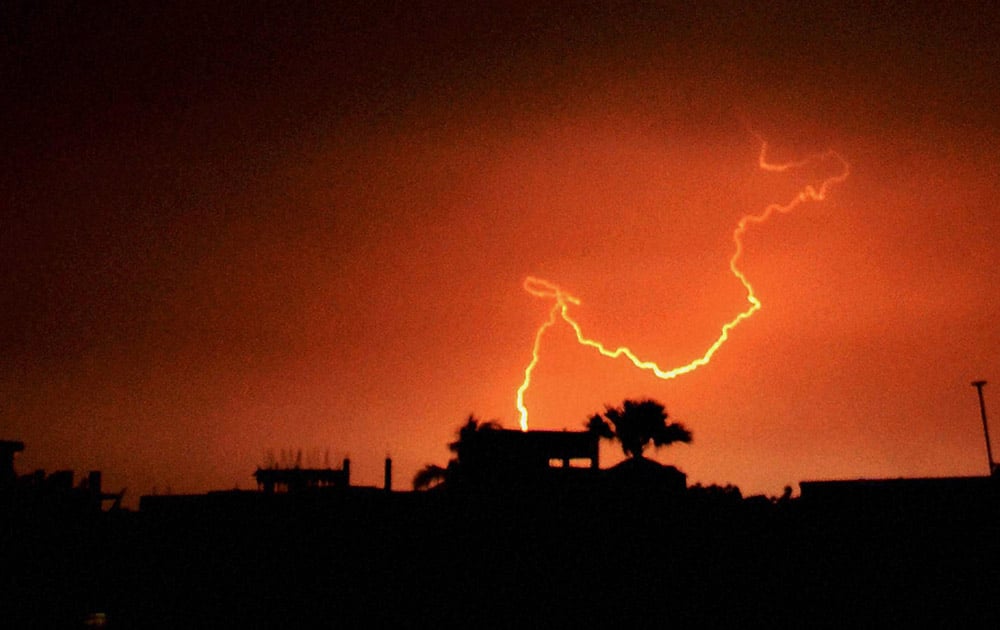 A flash of lightning is seen in the sky of Kolkata.