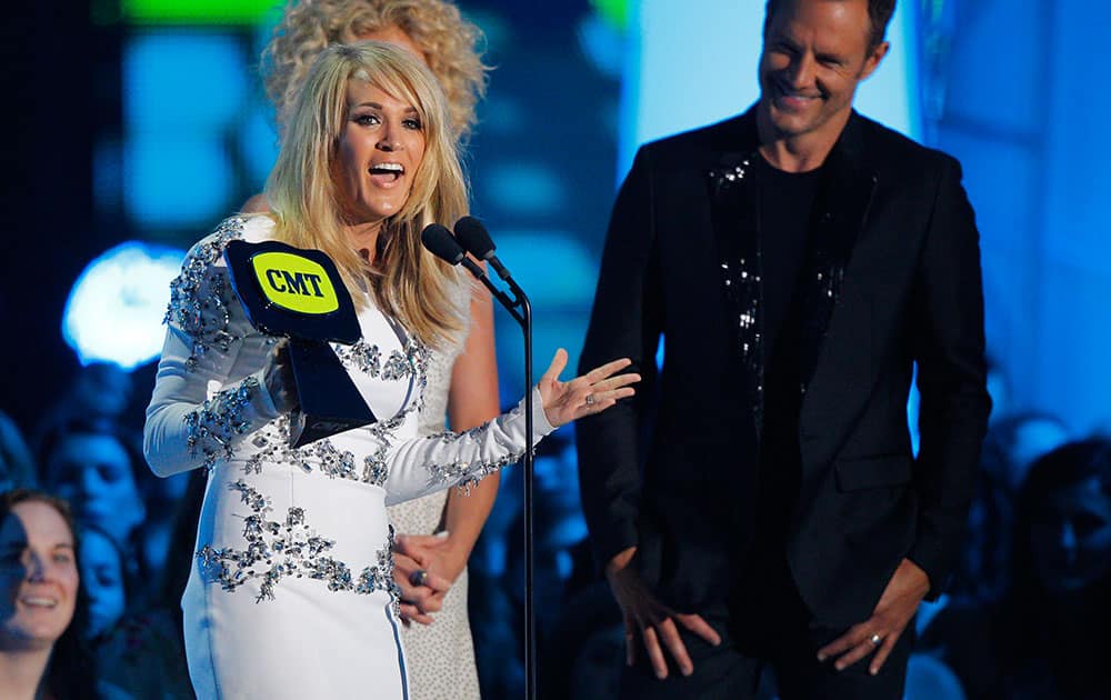 Carrie Underwood accepts the award for female video of the year for “Something in the Water” at the CMT Music Awards at Bridgestone Arena, in Nashville, Tenn.