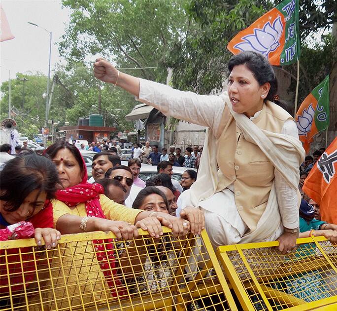 BJP women wing members holding a protest outside the residence of AAP leader Somnath Bharti in New Delhi.