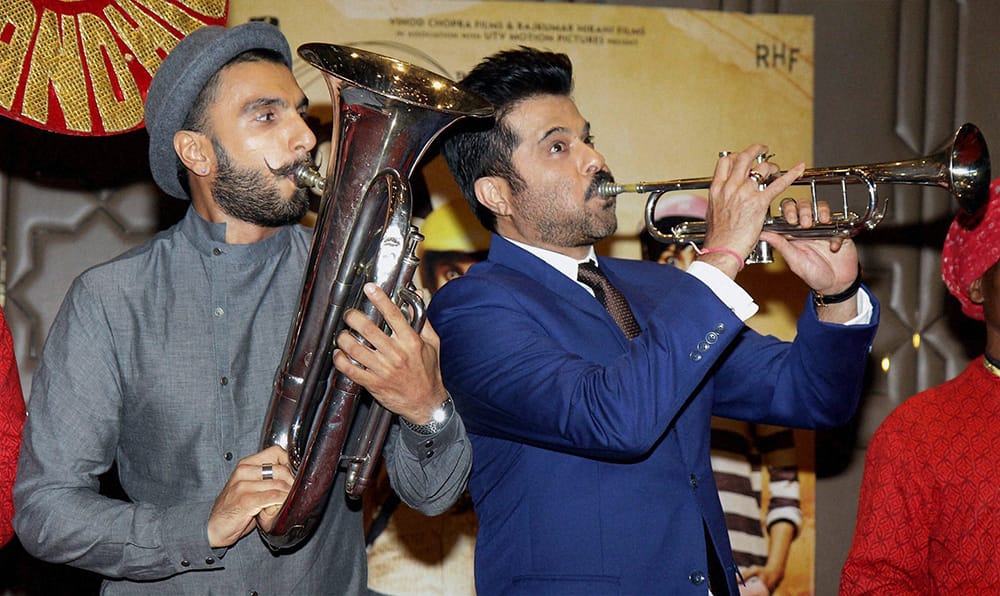 Bollywood actors Anil Kapoor and Ranveer Singh during the success party of film PK in Mumbai.