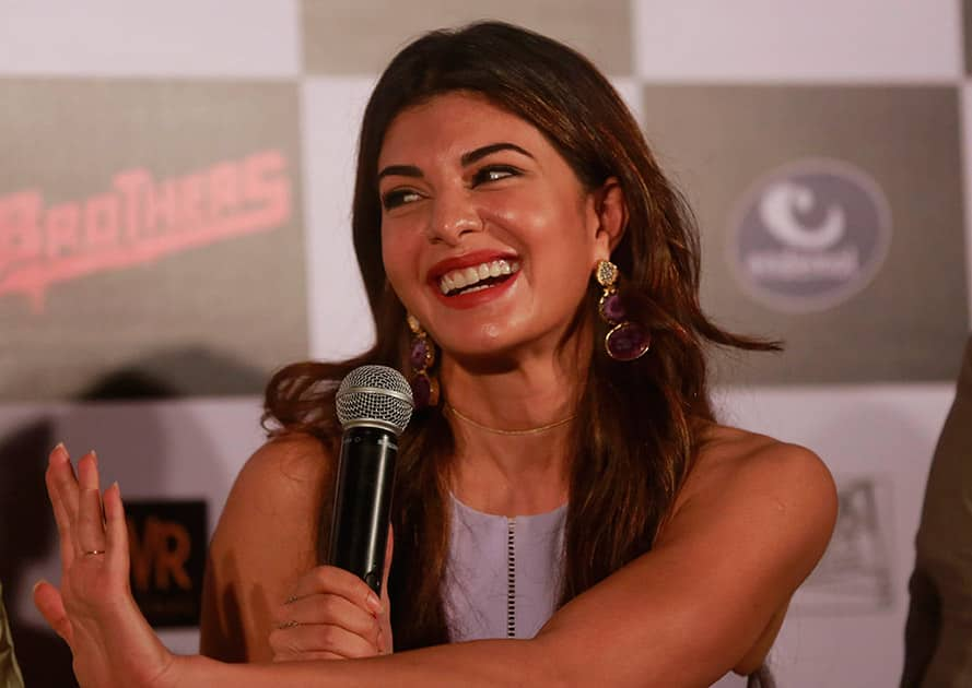 Bollywood actress, Jacqueline Fernandez gestures as she interacts with media during the trailer launch of her upcoming film ‘Brothers’ in Mumbai.